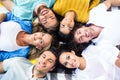 Friends lying together in a circle Royalty Free Stock Photo