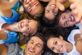 Friends lying together in a circle Royalty Free Stock Photo