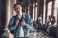 Friends make college fun.Portrait of a handsome young student with his friends in the background Royalty Free Stock Photo