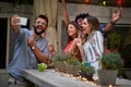 Friends making selfie together in cafe Royalty Free Stock Photo