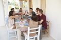 Friends making a toast at a dinner party on a patio, Ibiza Royalty Free Stock Photo