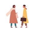 Friends meeting. Trendy women in stylish outwear talking together outdoors. Female characters in trendy clothes standing