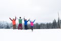 Friends On Mountain Top Winter Snow Forest, Young People Group Cheerful Raised Hands
