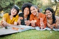 Friends are the people who make you laugh louder. a group of friends having champagne and pizza in a park. Royalty Free Stock Photo