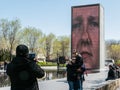 Friends photograph each other in front of Crown Fountain, Chicago Royalty Free Stock Photo