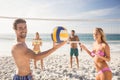 Friends playing beach volleyball Royalty Free Stock Photo