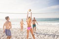 Friends playing beach volleyball Royalty Free Stock Photo