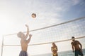 Friends playing beach volleyball Royalty Free Stock Photo