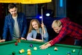 Friends playing billiard Royalty Free Stock Photo