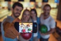 Friends playing bowling Royalty Free Stock Photo