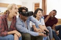 Friends Playing Computer Game With Virtual Reality Headset Royalty Free Stock Photo