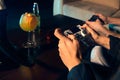 friends playing console video games. controller in hands closeup. neon lights