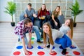 Friends playing twister Royalty Free Stock Photo