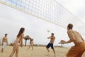 Friends Playing Volleyball On Beach Royalty Free Stock Photo