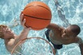 Friends Playing Water Basketball In Pool Royalty Free Stock Photo