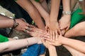 Friends putting their hands on top of each other. Sign of trustful friendship Royalty Free Stock Photo