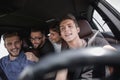 Group of happy friends on a car Royalty Free Stock Photo