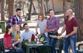 Friends relaxing at grill party Royalty Free Stock Photo