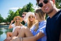 Friends relaxing at the lake Royalty Free Stock Photo