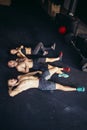 Friends relaxing and taking a break after working out at a cross-training gym Royalty Free Stock Photo