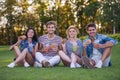 Friends resting in park Royalty Free Stock Photo