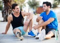 Friends resting after training Royalty Free Stock Photo