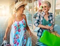 Friends, shopping and senior women outdoor, summer vacation or journey for adventure with happiness. Mature females Royalty Free Stock Photo