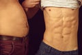 Friends showing bellies Royalty Free Stock Photo