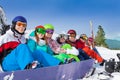 Friends with snowboards wearing ski googles Royalty Free Stock Photo