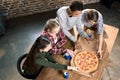Friends spending time together with pizza and soda drinks, eating pizza at home concept Royalty Free Stock Photo