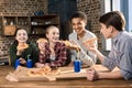 Friends spending time together with pizza and soda drinks, eating pizza at home concept Royalty Free Stock Photo