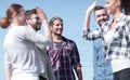 Friends students giving each other a high five. Royalty Free Stock Photo