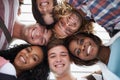 Friends, students and huddle on college campus, portrait and solidarity at university and education. People, diversity Royalty Free Stock Photo