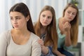 Friends supporting worried girl Royalty Free Stock Photo