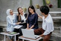 friends sympathize with a sad female friend while sitting together Royalty Free Stock Photo