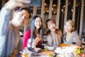 Friends taking selfie in hot pot restaurant Royalty Free Stock Photo