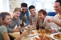 Friends Taking Selfie On Phone Having Fun At Home In Kitchen Eating Homemade Pizzas Royalty Free Stock Photo