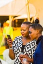 Friends taking a selfie photo at food and wine festival