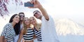 Friends taking selfie with smartphone Royalty Free Stock Photo