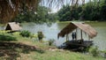 Friends talking on bamboo raft in long and quiet Pasak river