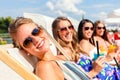 Friends tanning in beach bar Royalty Free Stock Photo