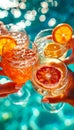 Friends Toasting Drinks by Poolside. Close-up of friends clinking glasses of sparkling drinks by pool