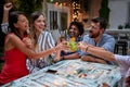 Friends toasting with female celebrant Royalty Free Stock Photo