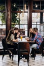 Friends toasting and drinking beer and cocktails in pub restaurant. Lifestyle party time concept Royalty Free Stock Photo