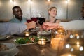 Friends toasting red wine in restaurant Royalty Free Stock Photo