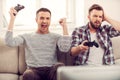 Friends and video games. Royalty Free Stock Photo