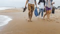 Friends Walking Along The Beach. Travel Tourism Journey Outdoor Concept Royalty Free Stock Photo