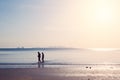 Friends walking in the sea beach, lonely summer season