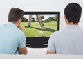 Friends watching golf on television at home Royalty Free Stock Photo