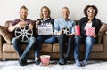 Friends watching movie together at home Royalty Free Stock Photo